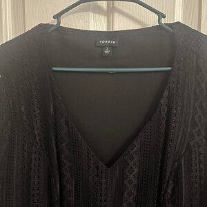 Dressy little black dress with lace print detail